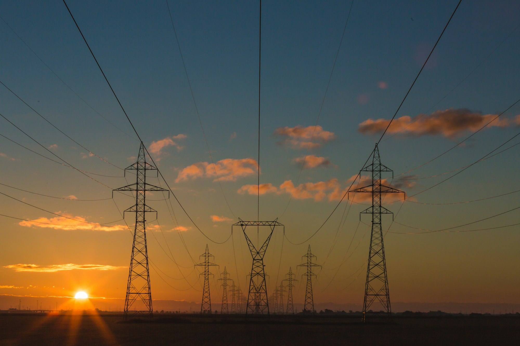 Transmission lines at sunset